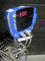 GE DINAMAP CARESCAPE V100 PATIENT MONITOR ON ROLLING STAND