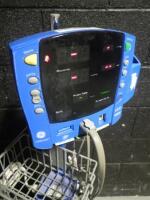 GE DINAMAP CARESCAPE V100 PATIENT MONITOR ON ROLLING STAND