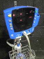 GE DINAMAP CARESCAPE V100 PATIENT MONITOR ON ROLLING STAND