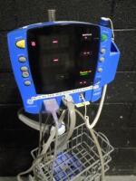 GE DINAMAP CARESCAPE V100 PATIENT MONITOR ON ROLLING STAND