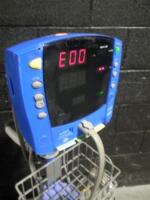 GE DINAMAP CARESCAPE V100 PATIENT MONITOR ON ROLLING STAND