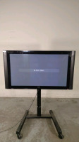 HITACHI 55HDT52 55 INCH PLASMA TV ON ROLLING STAND