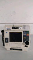 MEDTRONIC LIFEPAK 12 BIPHASIC DEFIB WITH PACER, ANALYZE, SPO2, NIBP, ECG, 2 BATTERIES, PADDLES, TEST LOAD, AC POWER ADAPTER