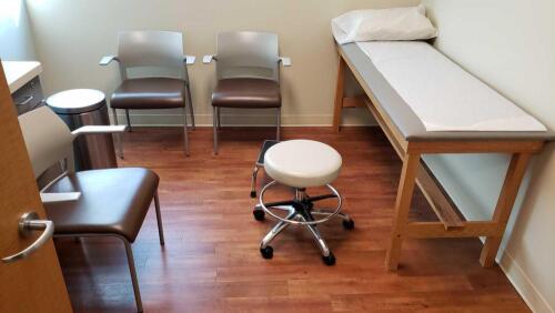 EXAM ROOM TO INCLUDE: EXAM TABLE, EXAM STOOL AND 2 CHAIRS