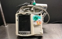 PHILIPS HEARTSTART MRX DEFIBRILLATOR W/PADDLES AND M3725A OHM TEST LOAD