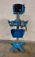 GE DINAMAP V100 VITAL SIGNS MONITOR W/ LEAD AND PROBE ON ROLLING STAND