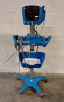 GE DINAMAP V100 VITAL SIGNS MONITOR W/ LEAD AND PROBE ON ROLLING STAND