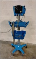GE DINAMAP V100 VITAL SIGNS MONITOR W/ LEAD AND PROBE ON ROLLING STAND