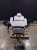 MIDMARK 630-020 POWER EXAM TABLE WITH HAND/ FOOT CONTROL, LEG STIRRUPS AND ARTICULATING ARMBOARDS DOM 11-04-2021