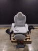 MIDMARK 630-020 POWER EXAM TABLE WITH HAND/ FOOT CONTROL, LEG STIRRUPS AND ARTICULATING ARMBOARDS DOM 11-04-2021 - 2