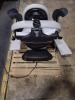MIDMARK 630-020 POWER EXAM TABLE WITH HAND/ FOOT CONTROL, LEG STIRRUPS AND ARTICULATING ARMBOARDS DOM 11-04-2021 - 5