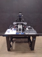OLYMPUS IX73 LAB MICROSCOPE WITH 6 OBJECTIVES AND EYE PIECES 10X/22, WITH DELL OPTI PLEX 3080 MICRO PC, RI SATURN 5 ACTIVE LASER SYSTEM AND INTEGRA 3 MICROMANIPULATOR ON A CLEAN BENCH TABLE