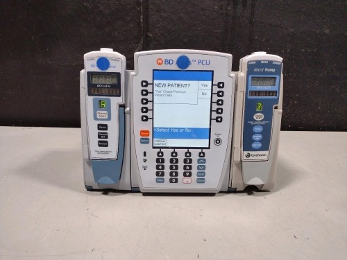 ALARIS PCU 8015 SERIES INFUSION PUMP WITH 8100 SERIES MODULES