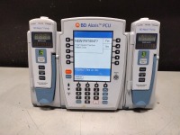 ALARIS PCU 8015 SERIES INFUSION PUMP WITH 8100 SERIES MODULES