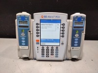 ALARIS PCU 8015 SERIES INFUSION PUMP WITH 8100 SERIES MODULES