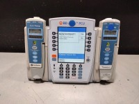 ALARIS PCU 8015 SERIES INFUSION PUMP WITH 8100 SERIES MODULES