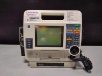MEDTRONIC/PHYSIO-CONTROL LIFEPAK 12 DEFIB WITH PACING, 12 LEAD ECG, SPO2, CO2, NIBP, ANALYZE, PADDLES, AC POWER ADAPTER