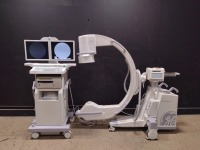 GE OEC SERIES 9800 GSP C-ARM SYSTEM WITH 9 INCH II TO INCLUDE DUAL MONITOR WORKSTATION WITH HAND CONTROL (SERIAL# 8S-1979) (DOM: 11/2003)