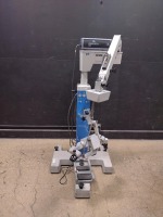 CARL ZEISS SURGICAL MICROSCOPE TO INCLUDE DUAL MOUNT BINOCULARS WITH EYEPIECES BOTH (10X/22B) BOTTOM LENSE (F 250) & MULTI-FUNCTION FOOTSWITCH ON UNIVERSAL S3 STAND