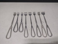 LOT OF RAKE RETRACTORS