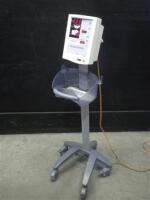 DATASCOPE ACCUTORR PLUS VITAL SIGNS MONITOR ON ROLLING STAND