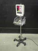 DATASCOPE ACCUTORR PLUS PATIENT MONITOR ON ROLLING STAND