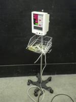 DATASCOPE ACCUTORR PLUS PATIENT MONITOR ON ROLLING STAND