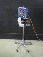 CRITIKON DINAMAP 8100 VITAL SIGNS MONITOR ON ROLLING STAND