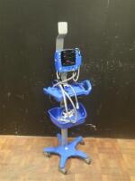 GE CARESCAPE V100 VITAL SIGN MONITOR ON ROLLING STAND