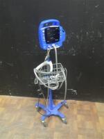 GE PROCARE VITAL SIGN MONITOR ON ROLLING STAND