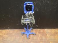 GE PROCARE VITAL SIGN MONITOR ON ROLLING STAND