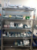 CART AND CONTENTS TO INCLUDE: TUBES, PENCILS AND BANDAGING