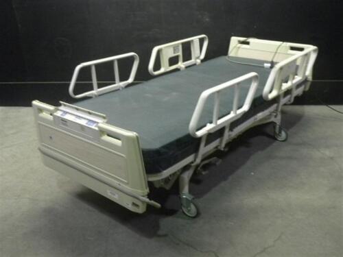 HILL-ROM ADVANCE 1105 HOSPITAL BED WITH HEAD AND FOOT BOARDS