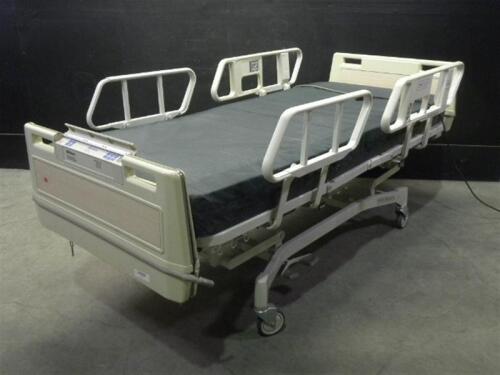 HILL-ROM ADVANCE 1105 HOSPITAL BED WITH HEAD AND FOOT BOARDS