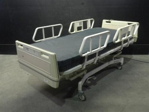 HILL-ROM ADVANCE 1105 HOSPITAL BED WITH HEAD AND FOOT BOARDS