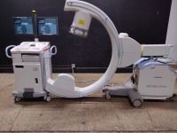 SIEMENS ARCADIS ORBIC C-ARM SYSTEM WITH 9 INCH II TO INCLUDE DUAL MONITOR WORKSTATION WITH HAND CONTROL & FOOTSWITCH (SERIAL# 23010) (DOM: 2012)