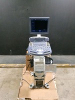 GE VOLUSON P8 ULTRASOUND MACHINE (SERIAL # 269705SU0) (DOM: 10/2014) (OPTIONS: 3D/4D ADVANCED, DICOM, BT ACTIVATION. SYSTEM IS MISSING MOST OF THE PLASTIC PANELS.) (13.0.0 SOFTWARE VERSION) (ID# 87)
