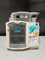 PHILIPS HEARTSTART MRX DEFIB WITH PACING, 3 LEAD ECG, SPO2, NIBP, ANALYZE, PADDLES, BATTERIES