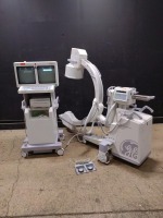 GE OEC 9800 PLUS VASCULAR C-ARM SYSTEM WITH 12 INCH II TO INCLUDE DUAL MONITOR WORKSTATION WITH HAND CONTROL & FOOTSWITCH (SERIAL# 82-3487) (DOM: 4/2005)