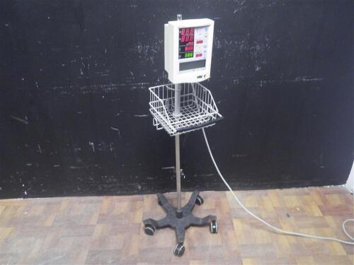 DATASCOPE ACCUTORR PLUS VITAL SIGN MONITOR ON ROLLING STAND