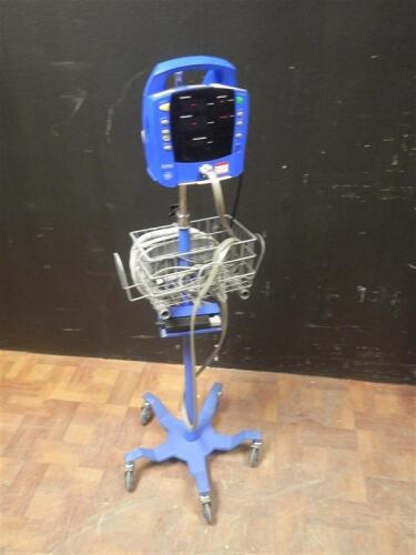 GE PROCARE VITAL SIGN MONITOR ON ROLLING STAND