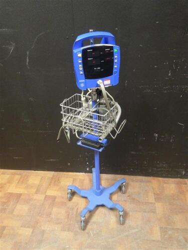 GE PROCARE VITAL SIGN MONITOR ON ROLLING STAND