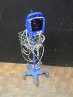 GE PROCARE VITAL SIGN MONITOR ON ROLLING STAND