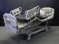 HILL-ROM ADVANTA P1600 HOSPITAL BED WITH HEAD AND FOOT BOARDS