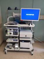 OLYMPUS ENDOSCOPY SYSTEM TO INCLUDE EXERA 3 CV-190 VIDEO PROCESSOR WITH MAJ-1430 PIGTAIL, EXERA 3 CLV-190 LIGHT SOURCE, UPD-3 POSITIONING SYSTEM, MU-1 MAINTENANCE UNIT WITH LEAKAGE TESTER, OEV262H, ERBE EIP 2 IRRIGATION PUMP, ERBE ECD 2 UNIT, DELL PC & KY