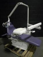 BELMONT X-CALIBUR DENTAL CHAIR W/EXAM LIGHT, FOOTSWITCHES AND 3 HANDPIECES