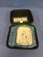 PHILLIPS HEARTSTART DEFIBRILLATOR WITH CASE