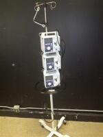 LOT OF ABBOTT & HOSPIRA PLUM XL INFUSION PUMPS ON ROLLING STAND