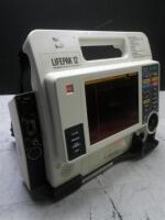 MEDTRONIC/PHYSIO-CONTROL LIFEPAK 12 BIPHASIC DEFIB WITH PACING, 12 LEAD ECG, CO2, SPO2, NIBP, ANALYZE, BATTERY