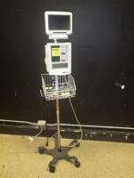 DATASCOPE ACCUTORR PLUS PATIENT MONITOR ON ROLLING STAND